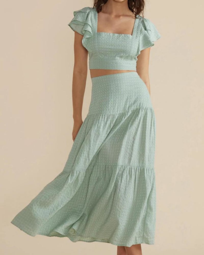 Front of a model wearing a size L Angove Midi Skirt in Mint in Mint by MINKPINK. | dia_product_style_image_id:332296